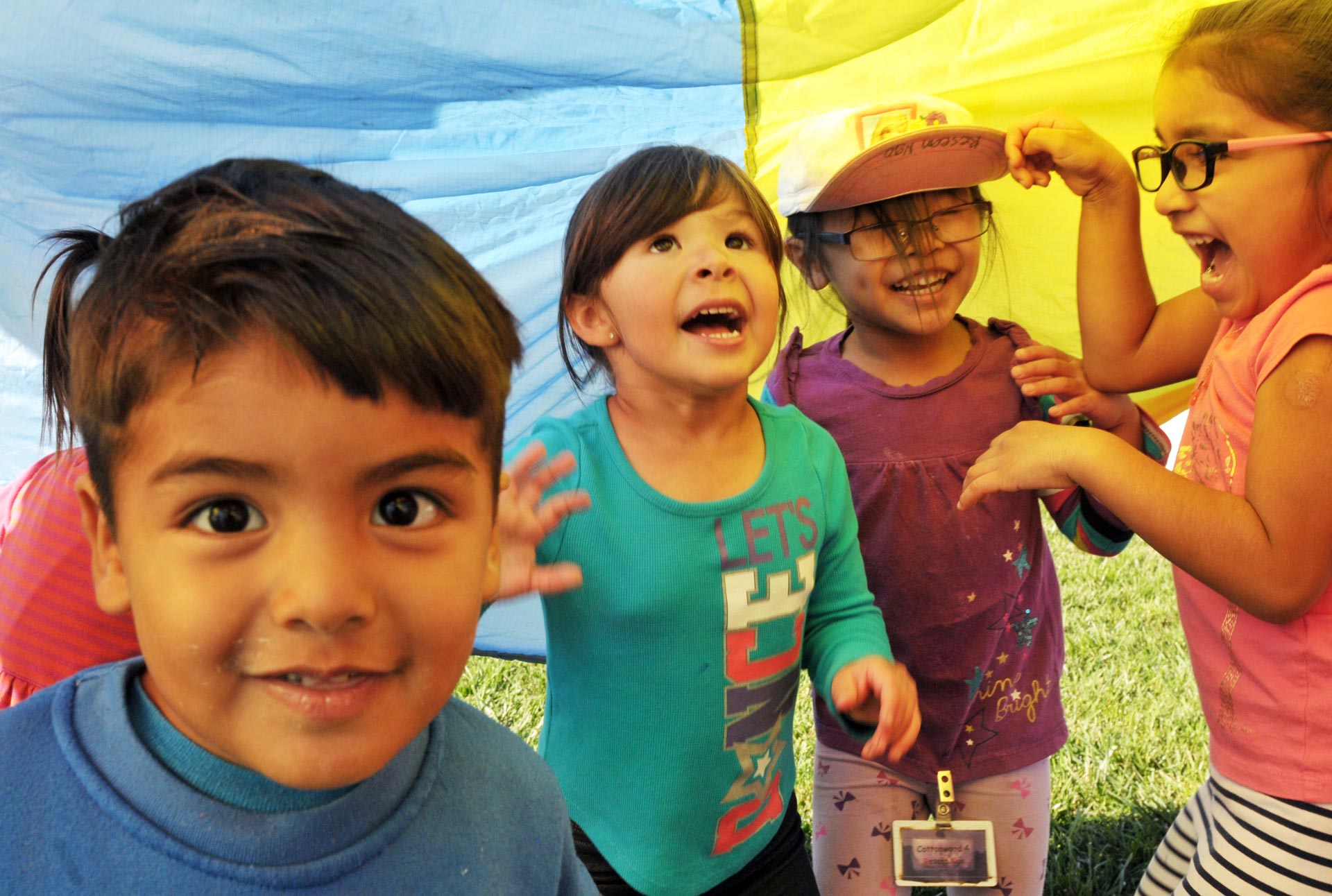 Kids bouncing and smiling